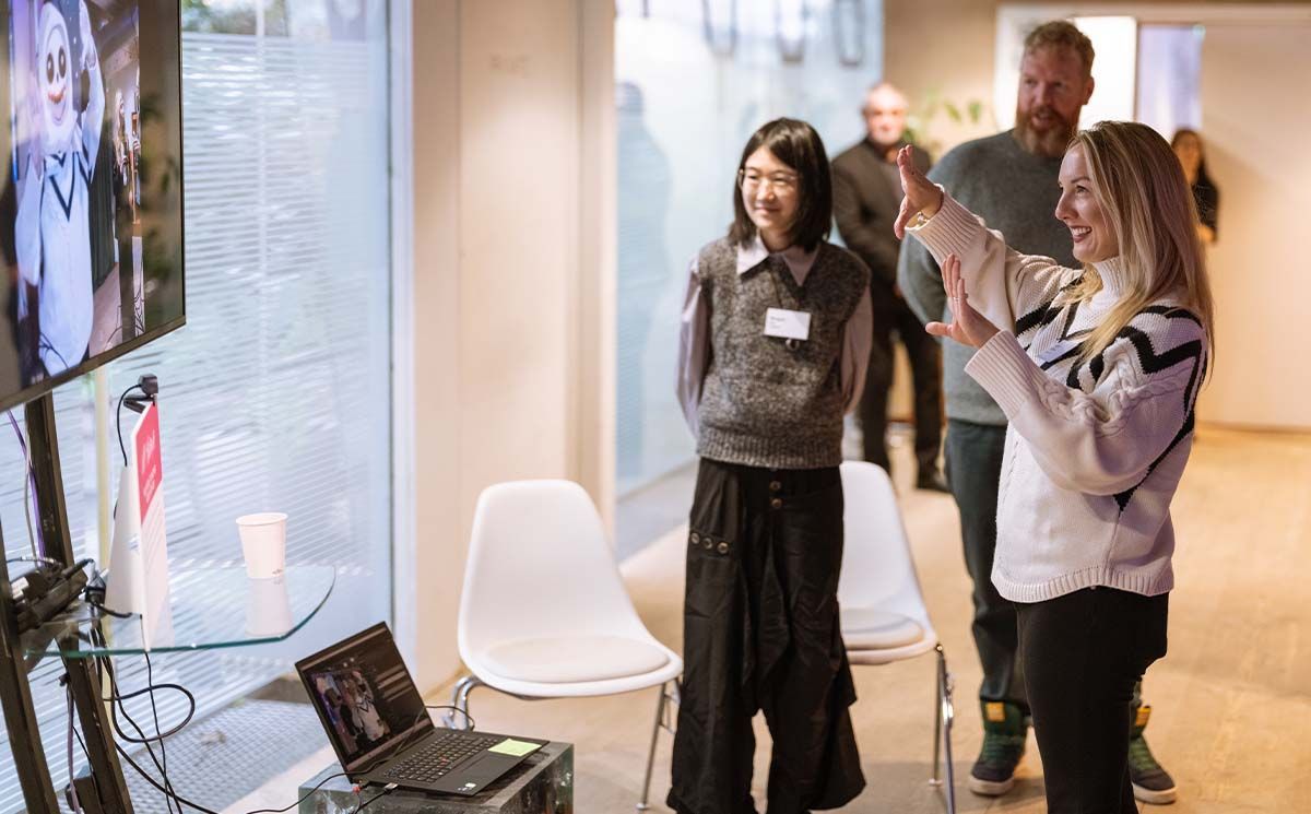 Visitor interacting with the live portal at WPP Stream.AI 2025